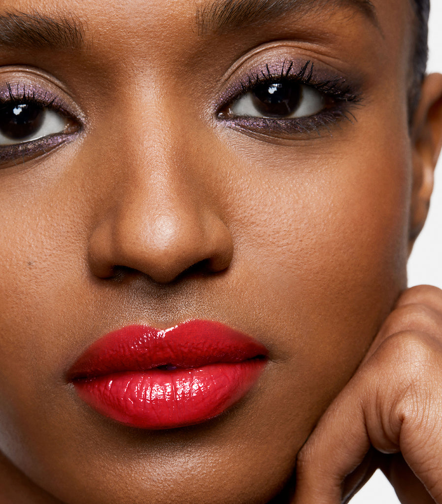 model wearing tinted lip balm in shock layer 